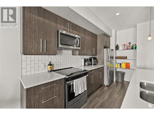 3638 Mission Springs Drive Unit# 505, Kelowna, BC - Indoor Photo Showing Kitchen With Double Sink With Upgraded Kitchen