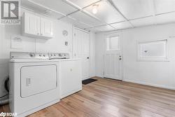 Main Level Laundry with walkout to back garden - 