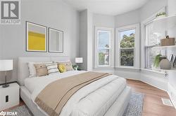 Virtually staged version of second bedroom - 