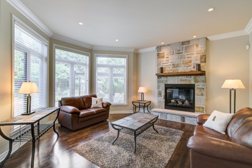 Living room - 53 Rue De Chaumont, Blainville, QC - Indoor Photo Showing Living Room With Fireplace