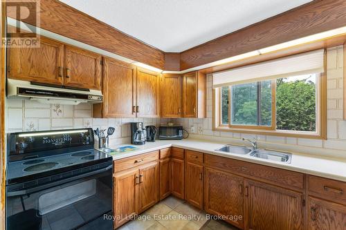 Oak cabinets - 97 Dorena Crescent, South Bruce Peninsula, ON - Indoor Photo Showing Kitchen With Double Sink