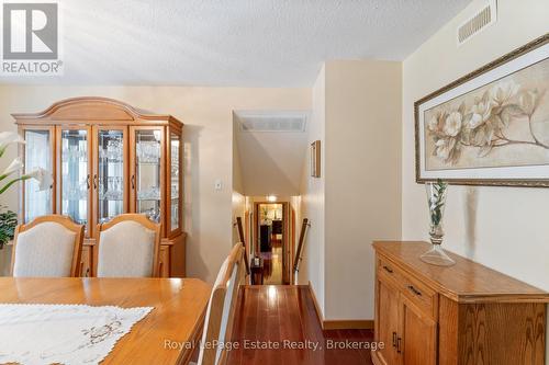 Stairs lead to bedroom wing - 97 Dorena Crescent, South Bruce Peninsula, ON - Indoor Photo Showing Dining Room