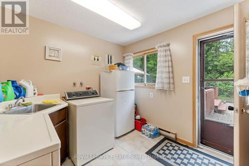 Laundry room exits to the backyard - 97 Dorena Crescent, South Bruce Peninsula, ON - Indoor Photo Showing Laundry Room