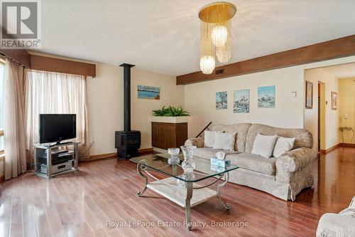 With natural gas fireplace - 97 Dorena Crescent, South Bruce Peninsula, ON - Indoor Photo Showing Living Room