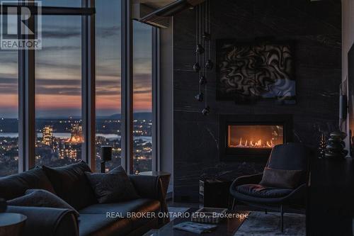 4401 - 805 Carling Avenue, Ottawa, ON - Indoor Photo Showing Living Room With Fireplace