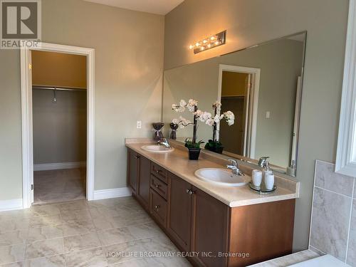Two Walk In Closet in Primary Room - 8 Wolford Court, Georgina, ON - Indoor Photo Showing Bathroom