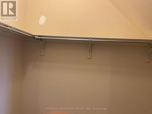 Third Bedroom Walk In Closet - 8 Wolford Court, Georgina, ON - Indoor With Storage