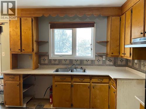 4620 Boundary Road, Fort Nelson, BC - Indoor Photo Showing Kitchen With Double Sink