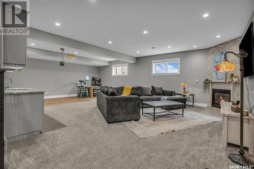 400 Prairie View Drive, Dundurn, SK - Indoor Photo Showing Basement With Fireplace