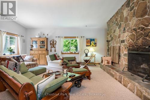 838151 4Th Line E, Mulmur, ON - Indoor Photo Showing Living Room With Fireplace