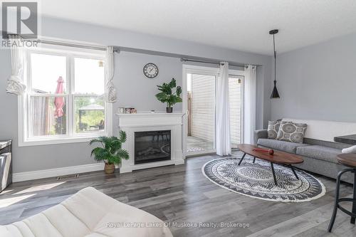 23 Little Ryans Way, Bracebridge (Macaulay), ON - Indoor Photo Showing Living Room With Fireplace