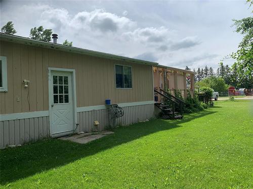 The Addition houses a great heated workshop - 3 Reiland Bay, Gladstone, MB - Outdoor With Exterior