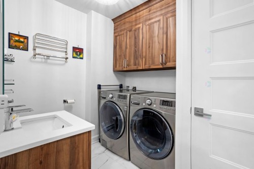 Salle d'eau - 103-910 Boul. Du Curé-Labelle, Blainville, QC - Indoor Photo Showing Laundry Room