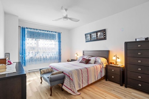 Chambre à coucher principale - 103-910 Boul. Du Curé-Labelle, Blainville, QC - Indoor Photo Showing Bedroom
