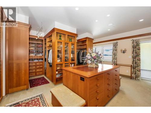 island counter with Burl Cherry wood veneered inlays - 202 Stepping Stones Crescent, Armstrong, BC - Indoor