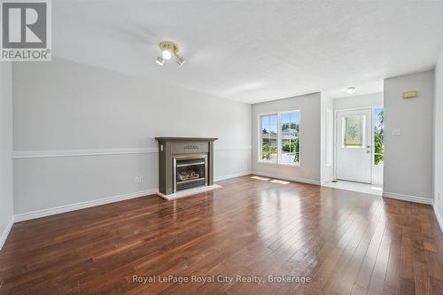 83 Inverness Drive, Guelph (Victoria North), ON - Indoor Photo Showing Living Room With Fireplace