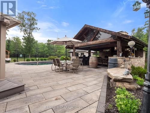 Gazebo has side curtains for winter and heat - 2738 Moyer Street, Pelham (North Pelham), ON - Outdoor With Deck Patio Veranda