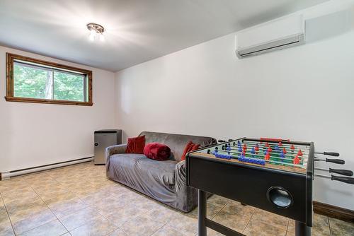 Salle familiale - 230 Rue Du Sommet, Entrelacs, QC - Indoor Photo Showing Other Room