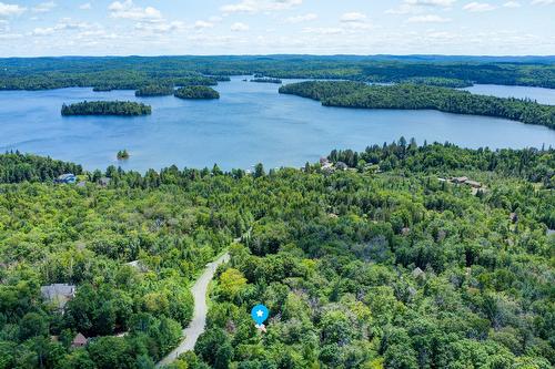 Aerial photo - 230 Rue Du Sommet, Entrelacs, QC - Outdoor With Body Of Water With View