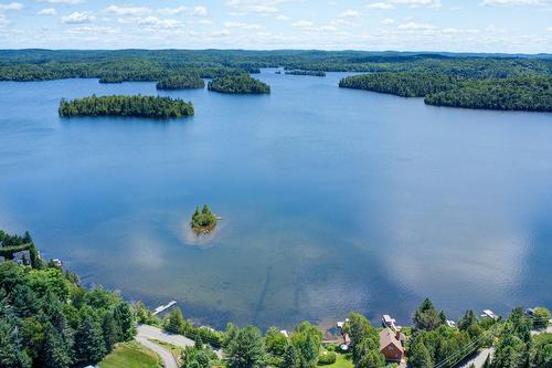 Aerial photo - 230 Rue Du Sommet, Entrelacs, QC - Outdoor With Body Of Water With View