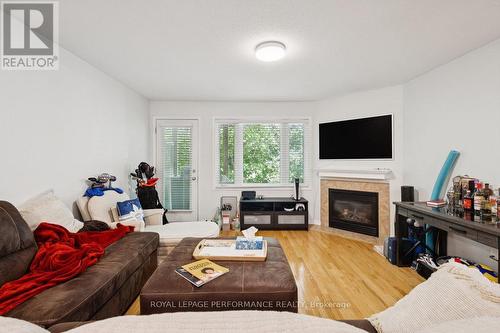 19 - 90 Steele Park Private, Ottawa, ON - Indoor Photo Showing Living Room With Fireplace