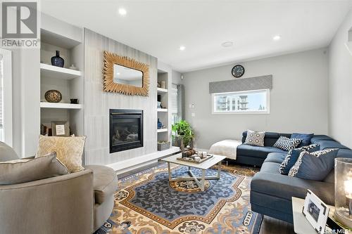 212 Secord Way, Saskatoon, SK - Indoor Photo Showing Living Room With Fireplace