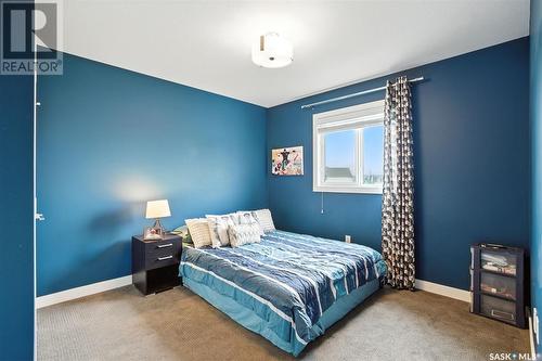 212 Secord Way, Saskatoon, SK - Indoor Photo Showing Bedroom