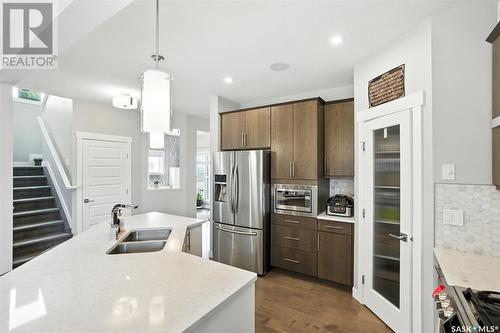 212 Secord Way, Saskatoon, SK - Indoor Photo Showing Kitchen With Double Sink With Upgraded Kitchen