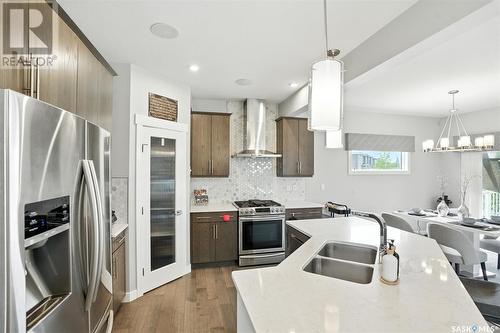 212 Secord Way, Saskatoon, SK - Indoor Photo Showing Kitchen With Double Sink With Upgraded Kitchen