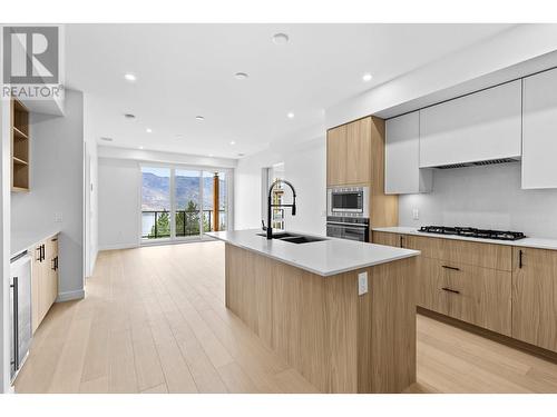 9652 Benchland Drive Unit# 409, Lake Country, BC - Indoor Photo Showing Kitchen With Double Sink With Upgraded Kitchen