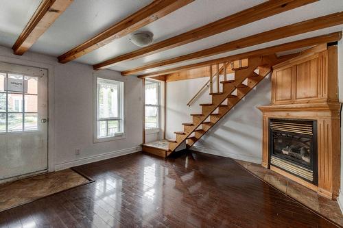 Salon - 75 Rue Bouthillier N., Saint-Jean-Sur-Richelieu, QC - Indoor Photo Showing Other Room With Fireplace
