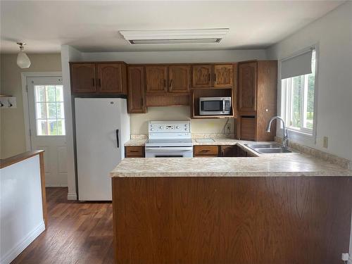 25 Machray Avenue W, Crystal City, MB - Indoor Photo Showing Kitchen With Double Sink