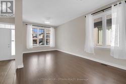 Living room featuring stylist new lights fixtures - 