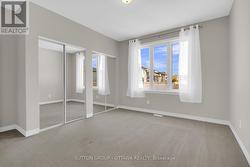 Bedroom with a generous double closet for storage - 