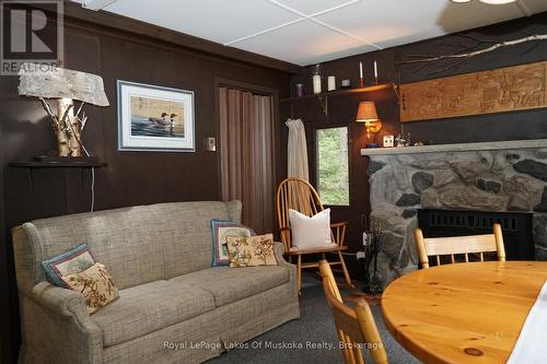 1173 Lake Of Two Rivers, South Algonquin, ON - Indoor Photo Showing Dining Room With Fireplace