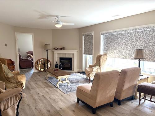 704-2245 Atkinson Street, Penticton, BC - Indoor Photo Showing Living Room With Fireplace