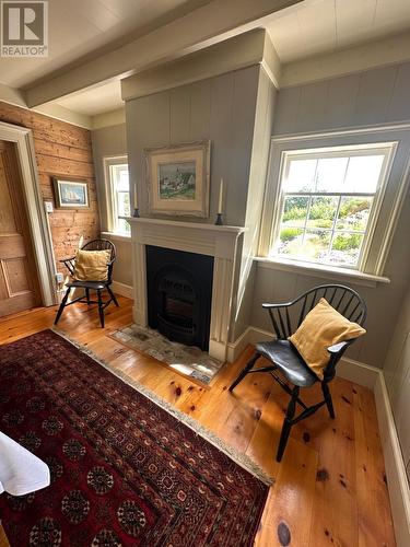 19 West Street, Trinity, NL - Indoor Photo Showing Living Room With Fireplace