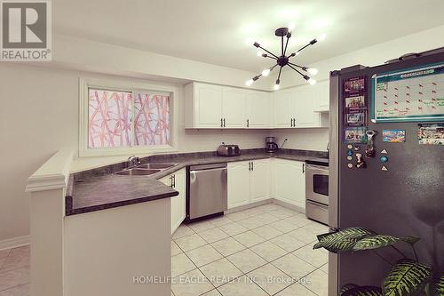 12 Indigo Street, Richmond Hill, ON - Indoor Photo Showing Kitchen With Double Sink