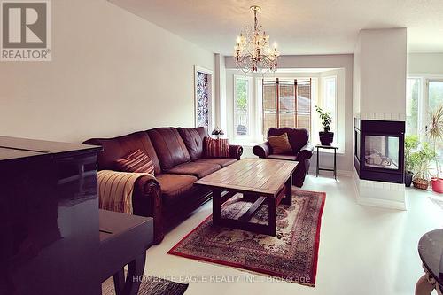 12 Indigo Street, Richmond Hill, ON - Indoor Photo Showing Living Room With Fireplace