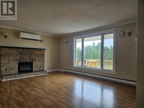 122 Harris Drive, Marystown, NL - Indoor Photo Showing Living Room With Fireplace