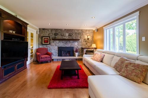 Family room - 8170 Rue Santiago, Brossard, QC - Indoor Photo Showing Living Room With Fireplace
