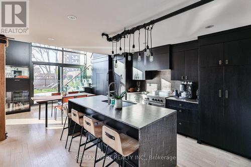 Designer kitchen, denim granite waterfall counter - 318 - 200 Stinson Street, Hamilton, ON - Indoor