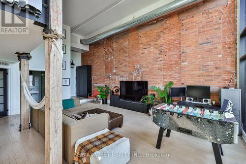 Original Victorian Era Brick , Hardwood floors - 318 - 200 Stinson Street, Hamilton, ON - Indoor With Fireplace