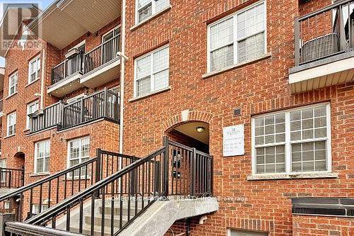 304 - 35 Strangford Lane S, Toronto, ON - Outdoor With Balcony With Exterior