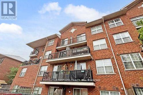304 - 35 Strangford Lane S, Toronto, ON - Outdoor With Balcony