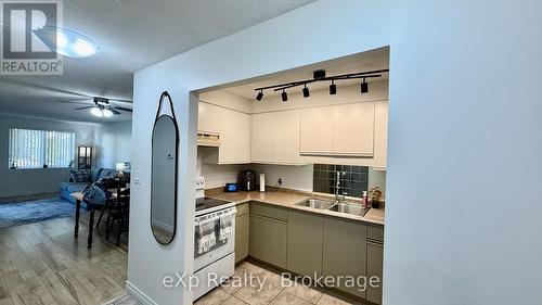 105 - 536 11Th Avenue E, Hanover, ON - Indoor Photo Showing Kitchen With Double Sink