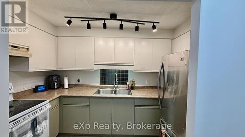 105 - 536 11Th Avenue E, Hanover, ON - Indoor Photo Showing Kitchen With Double Sink