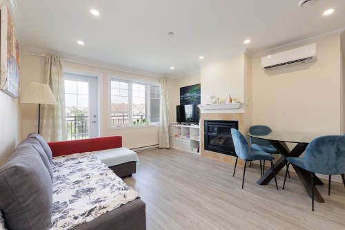 Overall view - 203-5282 Rue Du Sureau, Montréal (Pierrefonds-Roxboro), QC - Indoor Photo Showing Living Room With Fireplace