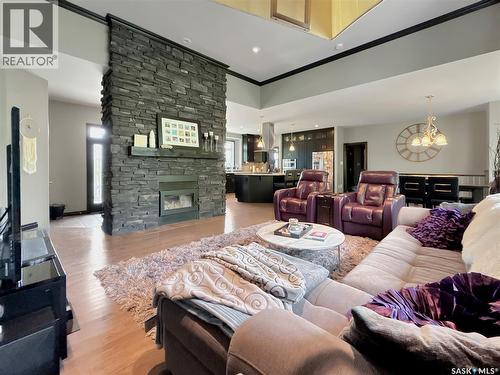 Lazy Dollar Ranch, Brock Rm No. 64, SK - Indoor Photo Showing Living Room With Fireplace