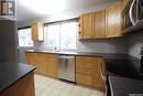 530 3Rd Avenue, Esterhazy, SK  - Indoor Photo Showing Kitchen With Double Sink 